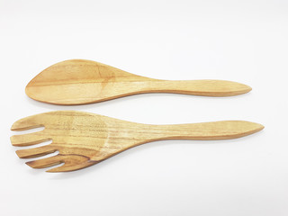 wooden brown traditional salad spoon in white isolated background