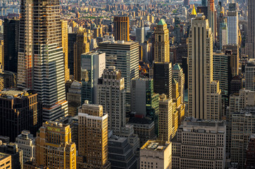 Cityscape of midtown skyscrapers and buildingds at sunset view from rooftop Rockefeller Center