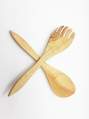 wooden brown traditional salad spoon in white isolated background