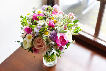 Wonderful luxury wedding bouquet of different flowers.