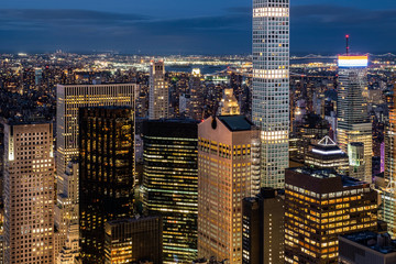 Dusck cityscape of midtown skyscrapers and buildingds view from rooftop Rockefeller Center