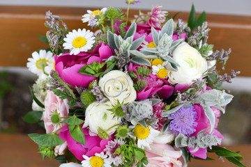Wonderful luxury wedding bouquet of different flowers.
