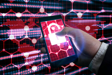 Hand touch on smartphone which show graphic insecure lock on the screen with red theme on background network.