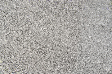  gray plaster on the insulated walls of the facade