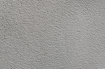  gray plaster on the insulated walls of the facade