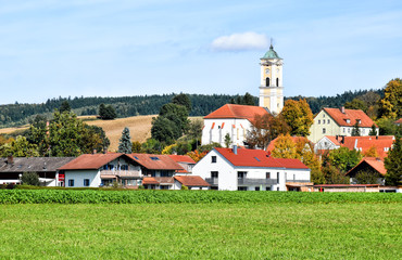 Cityscape of the Bavarian health resort Bad Birnbach with the late gothic parish church Maria Himmelfahrt (Germany)