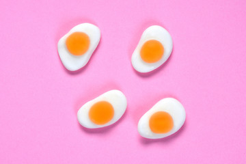 group of egg fried on pink background