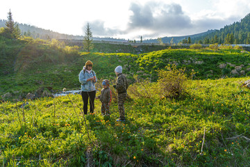 Fototapeta premium family walking in countryside