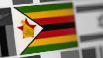 Zimbabwe national flag of country. Zimbabwe flag on the display, a digital moire effect.