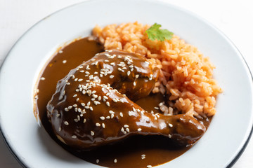 Mexican chicken with mole sauce and red rice