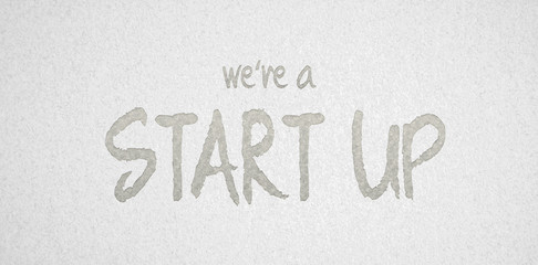 Papier mit Aufschrift "We're a start up"