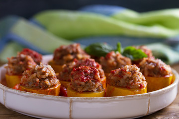 Zucchini stuffed with meat, rice and vegetables. Loaded zucchini