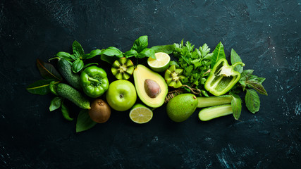 Fresh Green Fruits and Vegetables. Organic food. Rustic style. Top view. Free space for text.