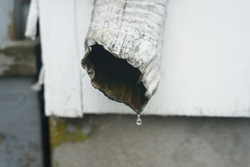 gutter water leak dirty
