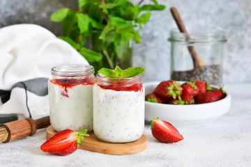 Yogurt with chia seeds and strawberries for breakfast. Good morning.