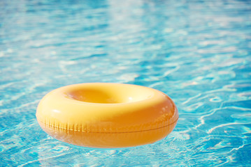 floating ring on blue water swimpool