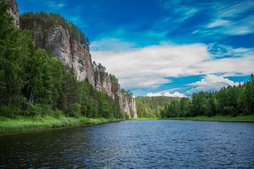 Fototapeta premium Forest massif with mountains and river