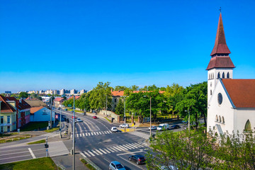 Fototapeta na wymiar Debrecen, Hungary - May 14, 2019: Reformed Church on a clear sunny day.