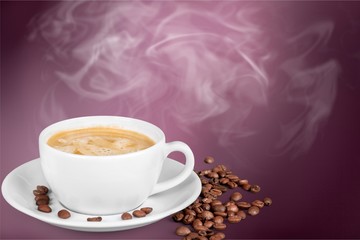 Coffee cup and coffee beans on  background