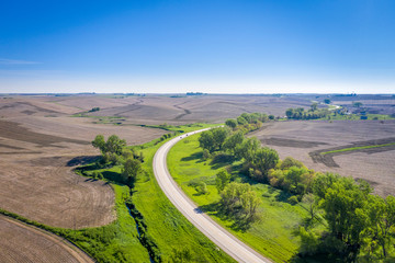 plowed fields and highway in Nebraska Sandhills