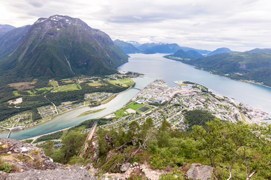 Romsdalseggen Hike, Andalsnes, Romsdalen, Norway: View from the Romsdalseggen with the viewing plattform, the city of Alesund, Rauma river and Romsdalsfjord.