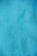 abstract turquoise painted wall. Texture of old rustic wall covered with blue-turquoise paint. background texture surface background. Abstract pattern of grunge turquoise painted wall. 