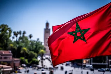 Selbstklebende Fototapete Marokko Flags over Jamaa el Fna, Marrakesh, Morocco