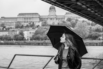 Tourism in Europe, vacation concept. Beautiful woman look at view of city streets, centre of city. Trip in Budapest 