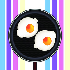 fried eggs in a pan