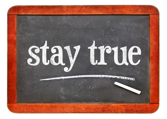 stay true text on blackboard