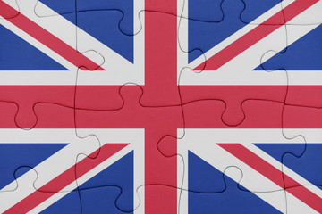 Fototapeta premium puzzle with the national flag of great britain.