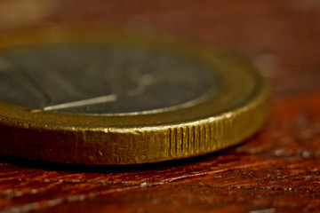 Edge Euro Coin Macro Isolated On Black Background. Detail of metallic money close up. EU money