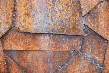 Rust metal texture background. The pieces of metal welded among themselves