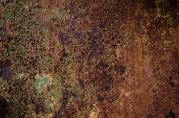 Rusted and oxidized metal texture. Background of the old ferrum sheet. Grunge wall with streaks of pitting. Concept of abstract corroded iron. Place for text