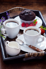 Black Coffee and chocolate muffins for breakfast
