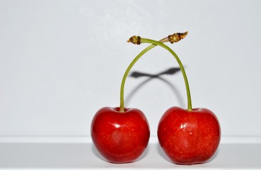 mature red delicious and sweet cherries