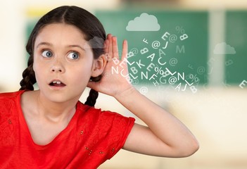 Little Girl Child Holding Hand near Ear