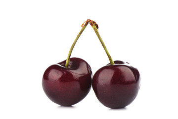 Ripe sweet cherry isolated on white background.