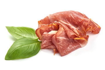 Italian prosciutto crudo or jamon, smoked meat, close-up, isolated on white background