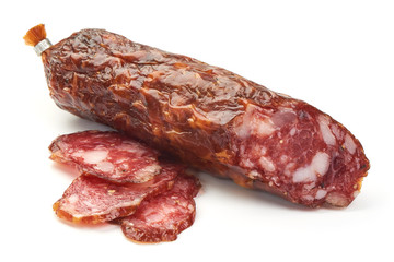 Dried pork sausage, traditional smoked meat, close-up, isolated on white background