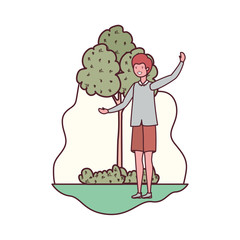 young man in landscape with trees and plants