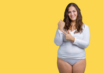 Beautiful plus size young overwight woman wearing white underwear over isolated background In hurry pointing to watch time, impatience, upset and angry for deadline delay