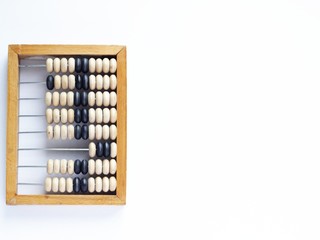 Education, training and account concept. Old wooden abacus on pure white background.