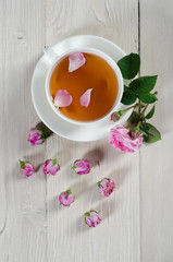 Cup of tea and rosebuds