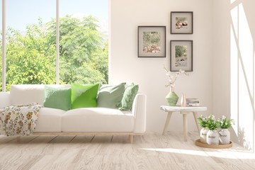 Stylish room in white color with sofa and summer landscape in window. Scandinavian interior design. 3D illustration