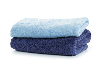 Stack of clean coloful  soft towels on white background