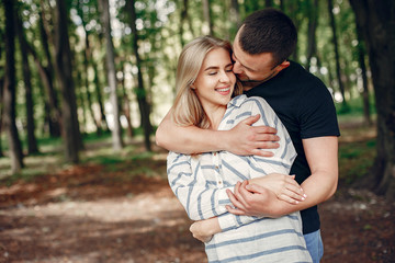Couple in a forest, warm summer, lovely weather