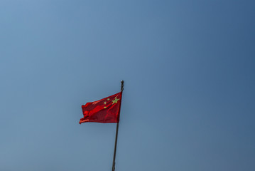 The Chinese flag fluttering in the wind in China