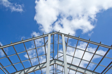 The structure of the building. Steel construction on the sky background. Electroplate steel metal. Zinc metal coating to protect against corrosion.