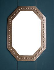 wooden painted green frame with a golden octagon in the middle. picture frame